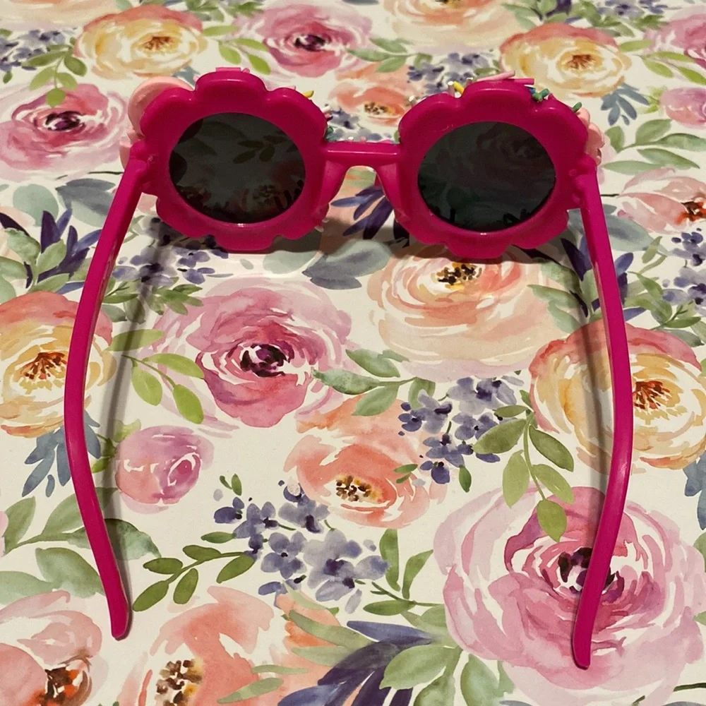 Girls hot pink flower shaped sprinkle sunglasses